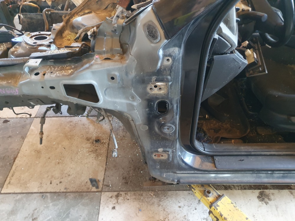 Передняя левая четверть Mazda 3 2011 BL