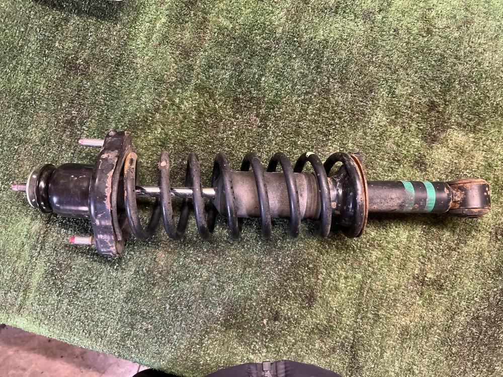 Стойка амортизатора Mitsubishi Lancer 2008 X