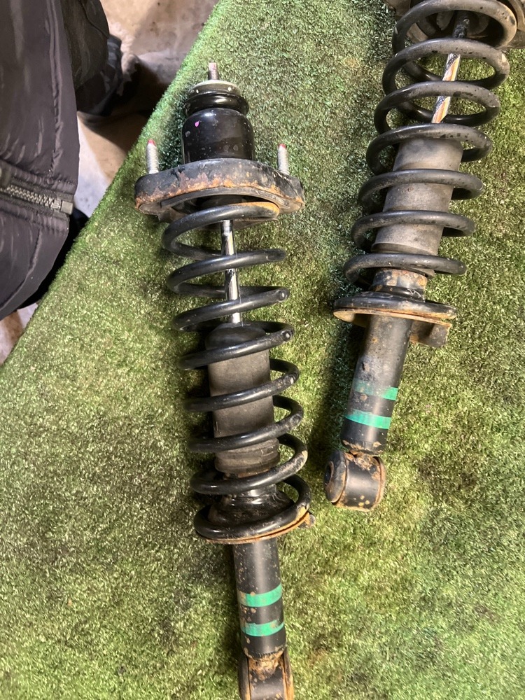 Стойка амортизатора Mitsubishi Lancer 2008 X