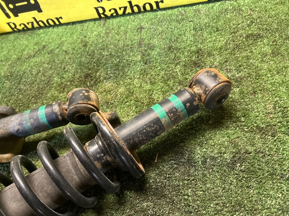 Стойка амортизатора Mitsubishi Lancer 2008 X