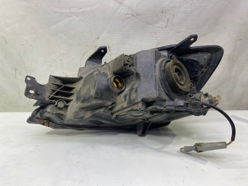 Фара Mitsubishi Lancer 2006