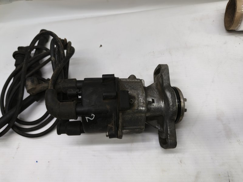 Трамблер Nissan Primera 1990