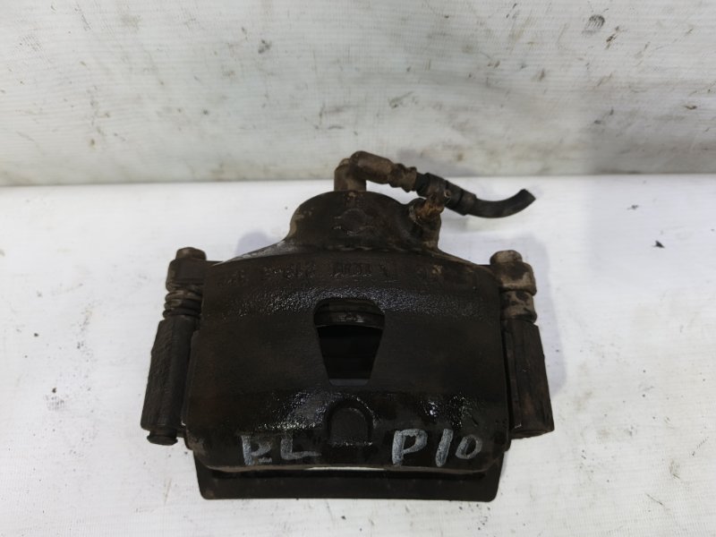 Суппорт Nissan Primera 1990