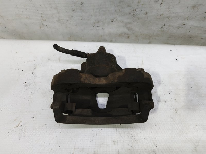 Суппорт Nissan Primera 1990