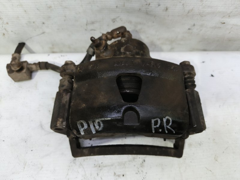 Суппорт Nissan Primera 1990