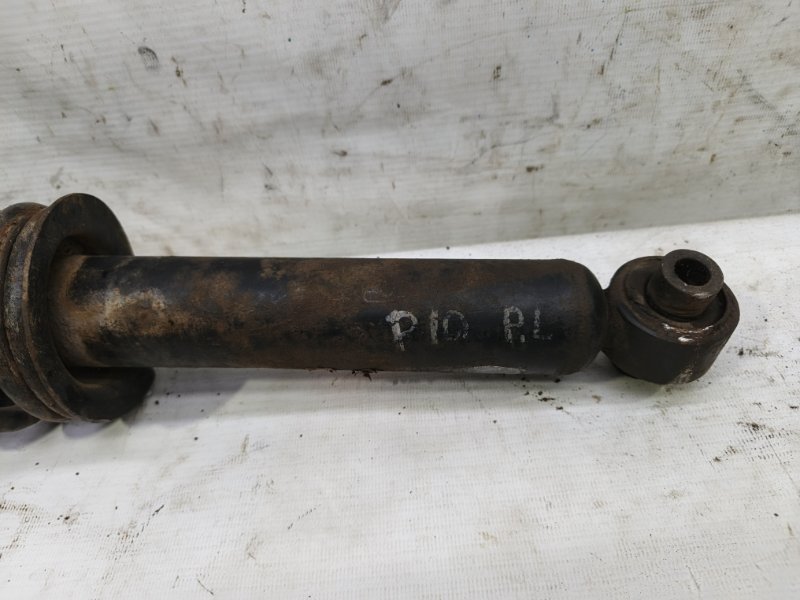 Амортизатор Nissan Primera 1990