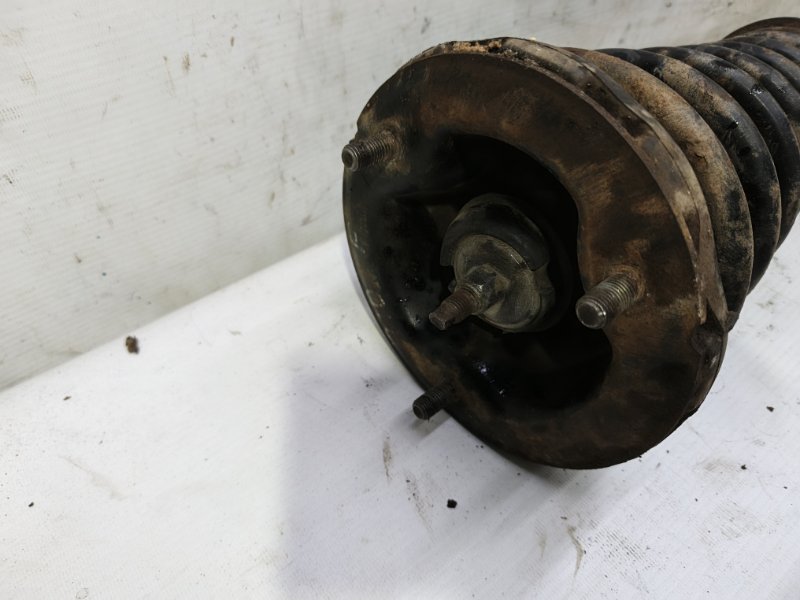 Амортизатор Nissan Primera 1990