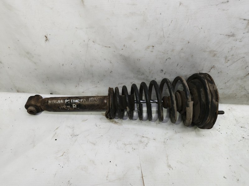 Амортизатор Nissan Primera 1990