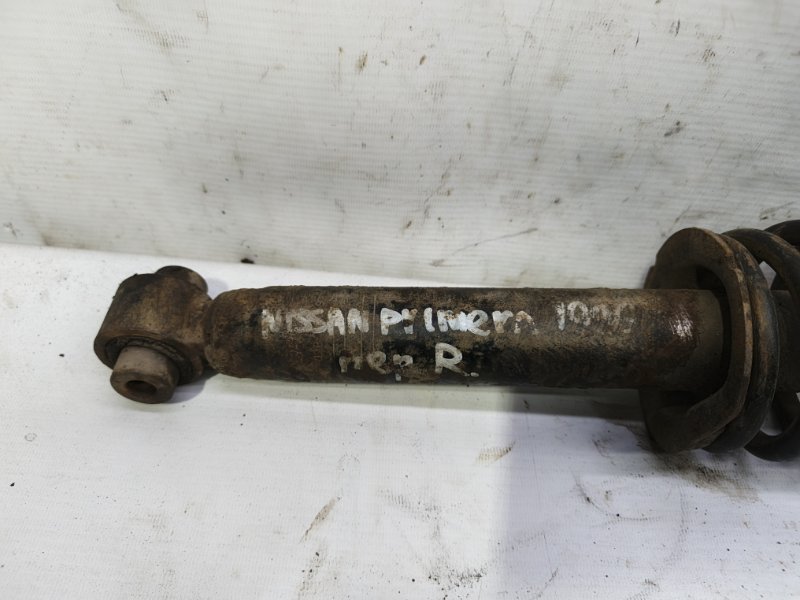 Амортизатор Nissan Primera 1990