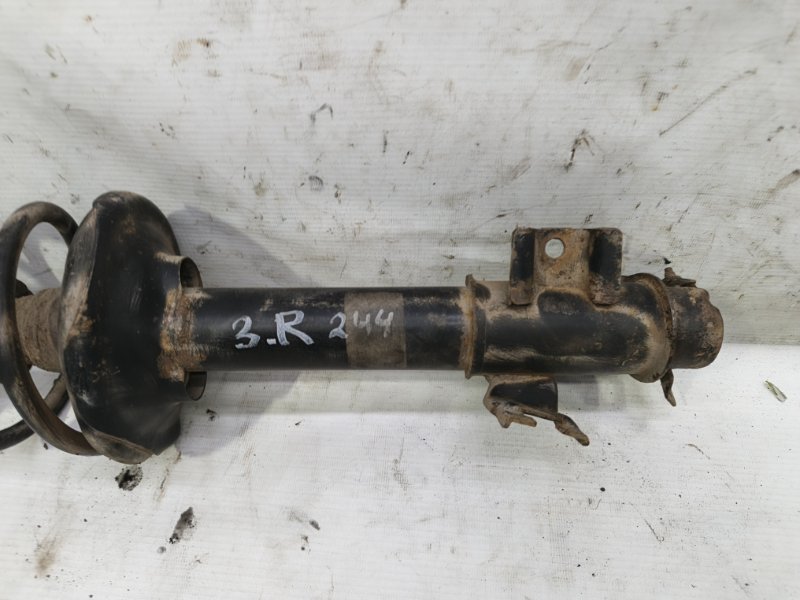 Амортизатор Nissan Primera 1990