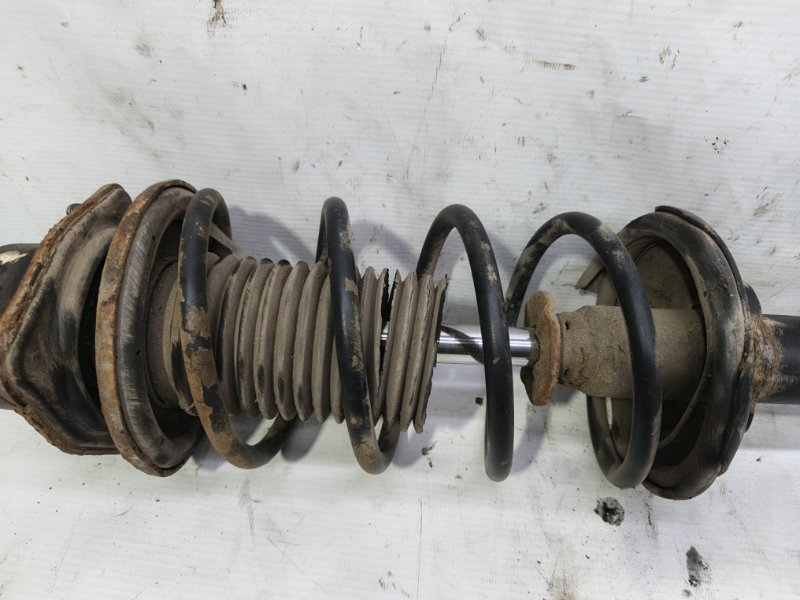 Амортизатор Nissan Primera 1990