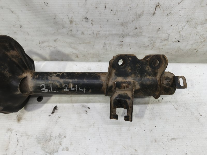 Амортизатор Nissan Primera 1990