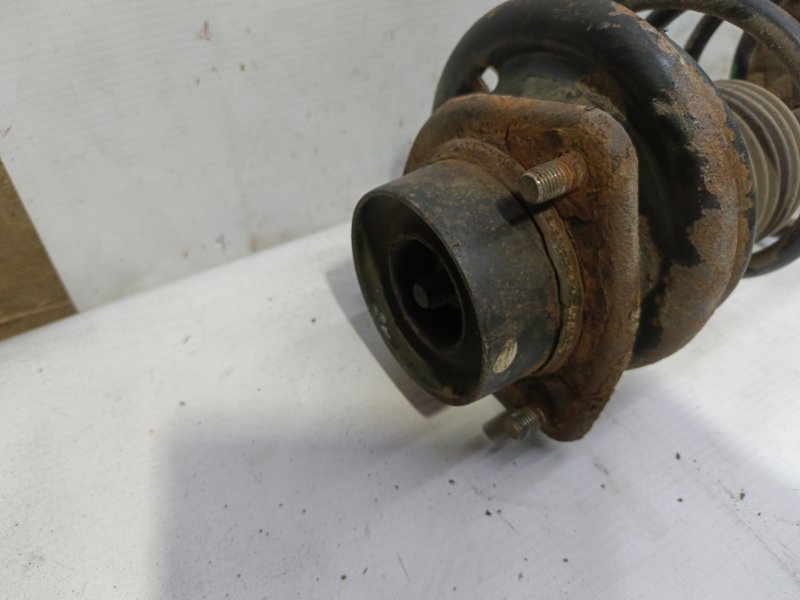 Амортизатор Nissan Primera 1990