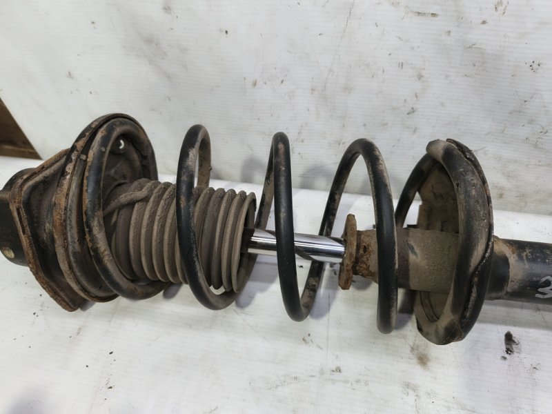 Амортизатор Nissan Primera 1990