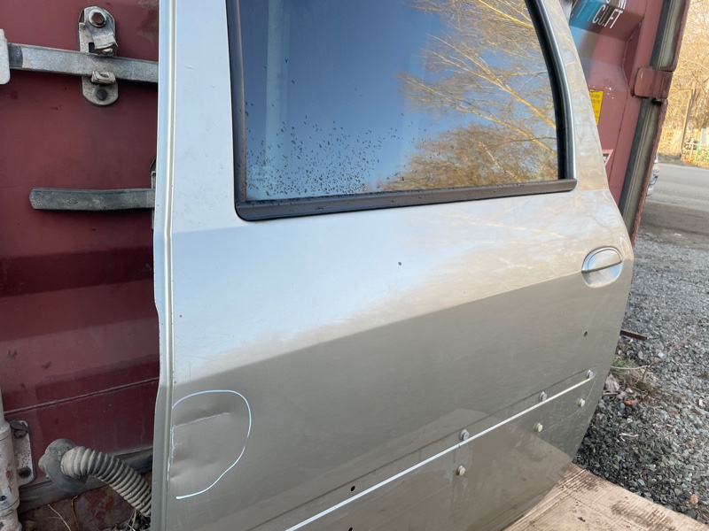 Дверь Lada Largus 2013