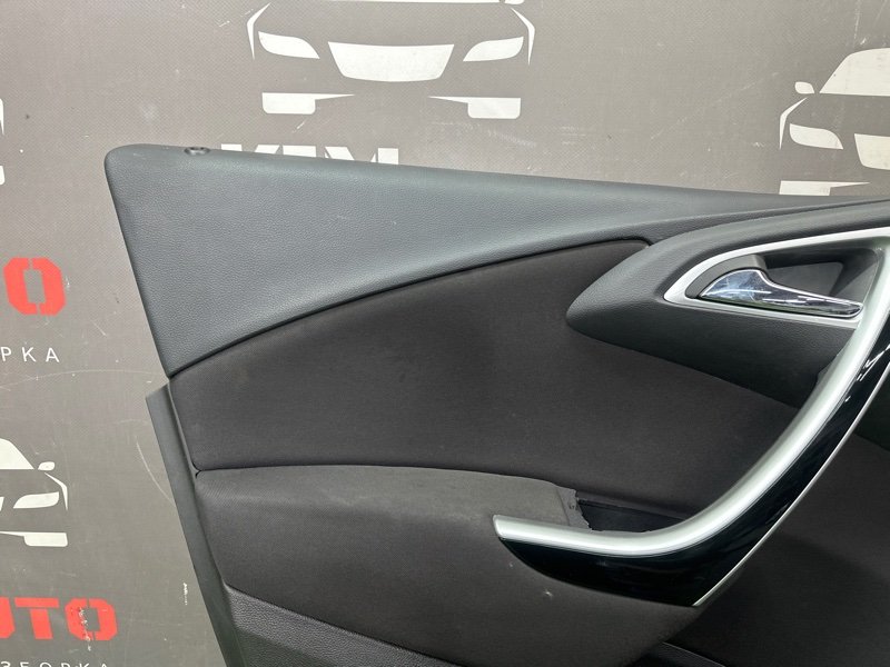 Обшивка двери Opel Astra J