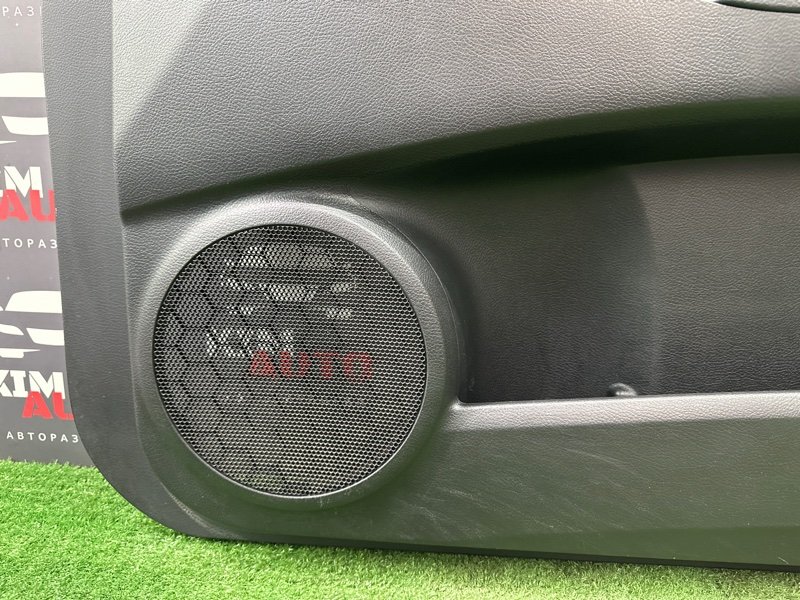 Обшивка двери Mazda 3 BL