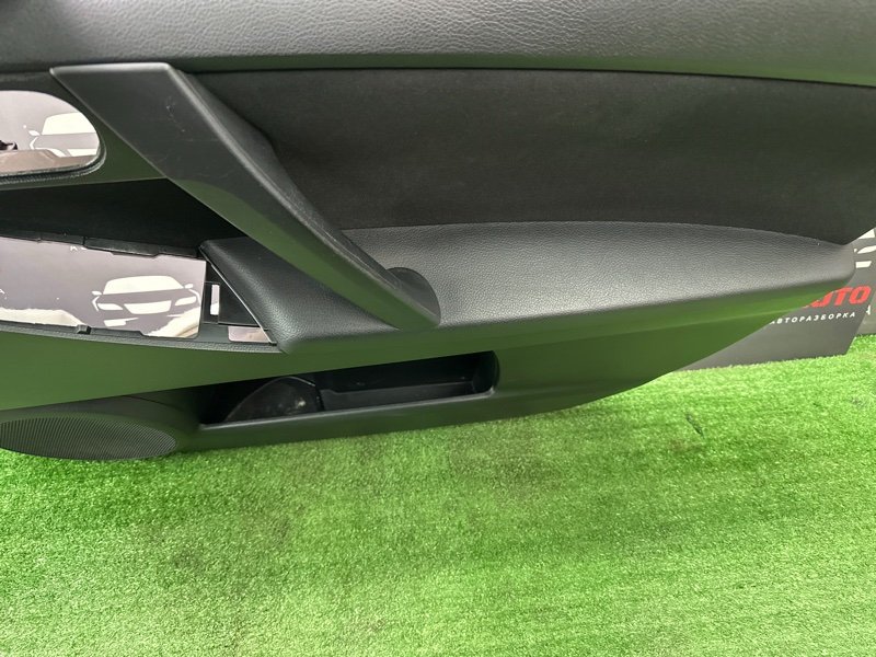 Обшивка двери Mazda 3 BL