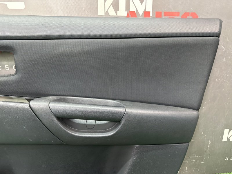 Обшивка двери Mazda 3 BK