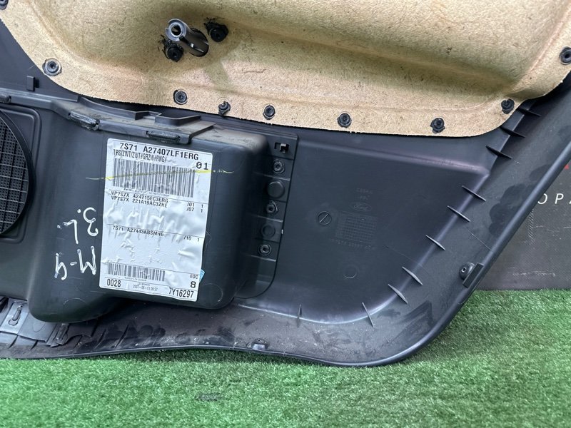Обшивка двери Ford Mondeo 4