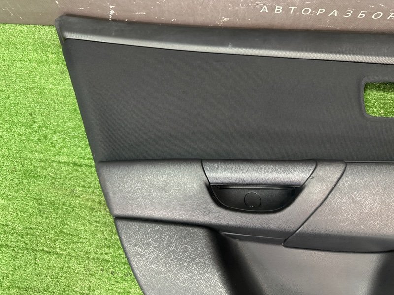 Обшивка двери Mazda 3 BK
