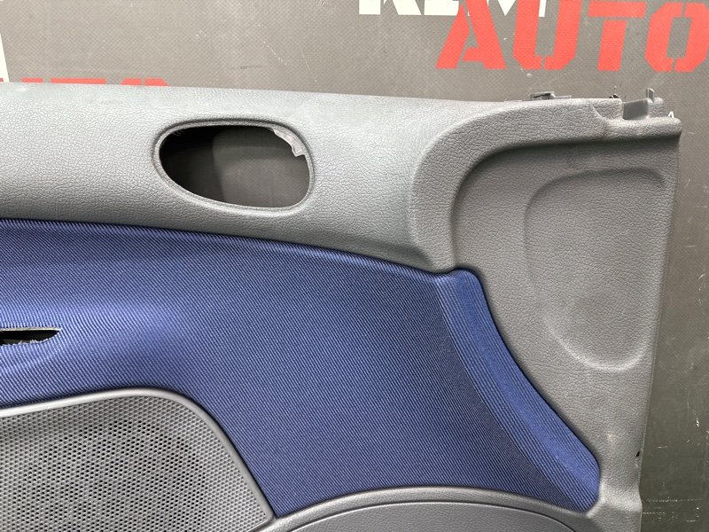 Обшивка двери Peugeot 206