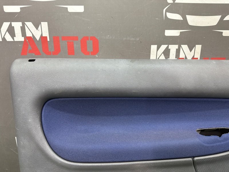 Обшивка двери Peugeot 206