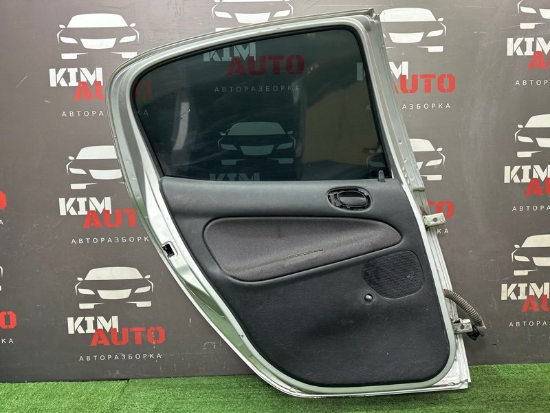 Дверь Peugeot 206