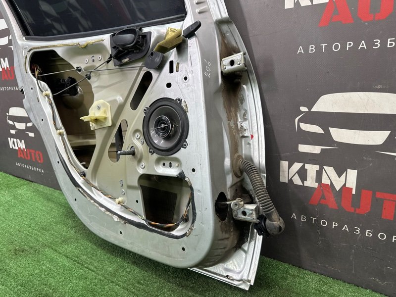 Дверь Peugeot 206