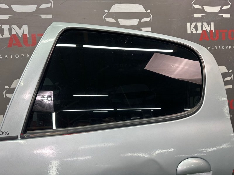 Дверь Peugeot 206