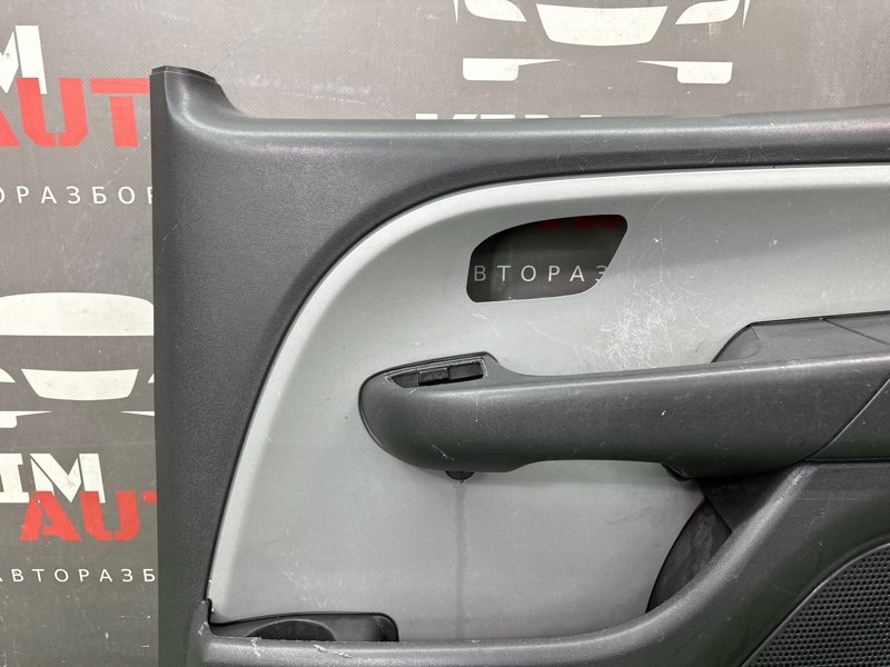 Обшивка двери Fiat Doblo