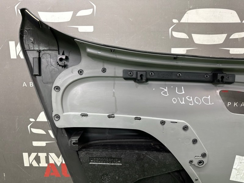 Обшивка двери Fiat Doblo