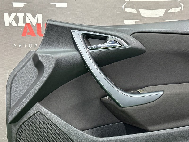 Обшивка двери Opel Astra J