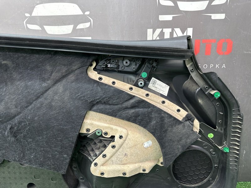 Обшивка двери Opel Astra J