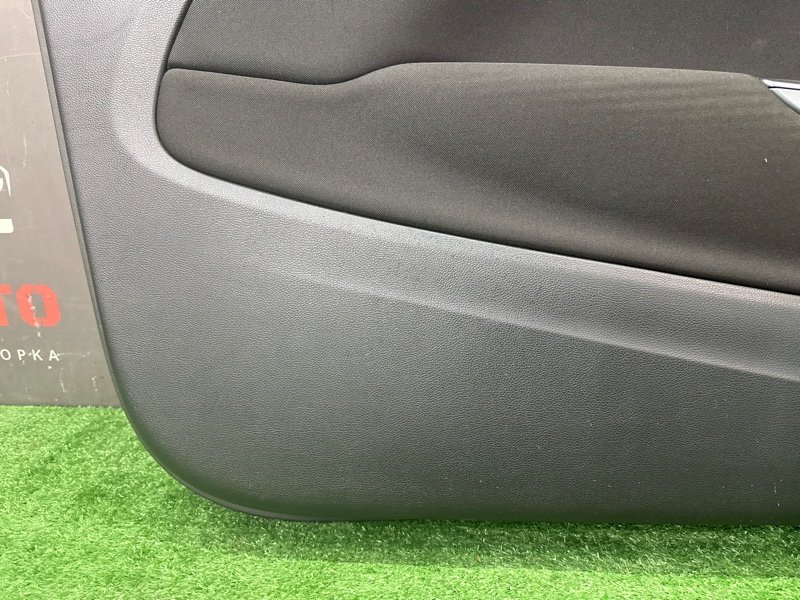 Обшивка двери Opel Astra J