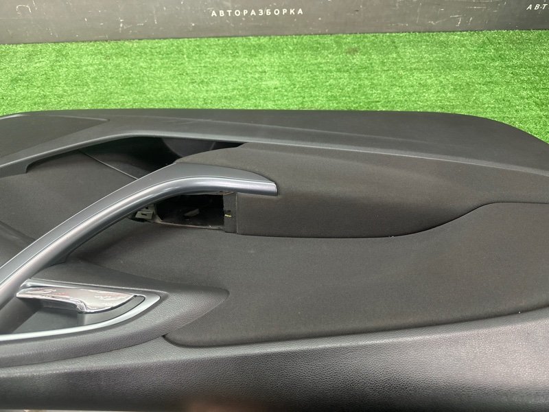 Обшивка двери Opel Astra J