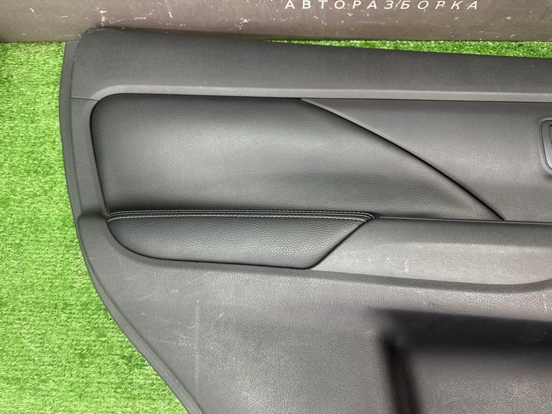 Обшивка двери Mitsubishi Outlander