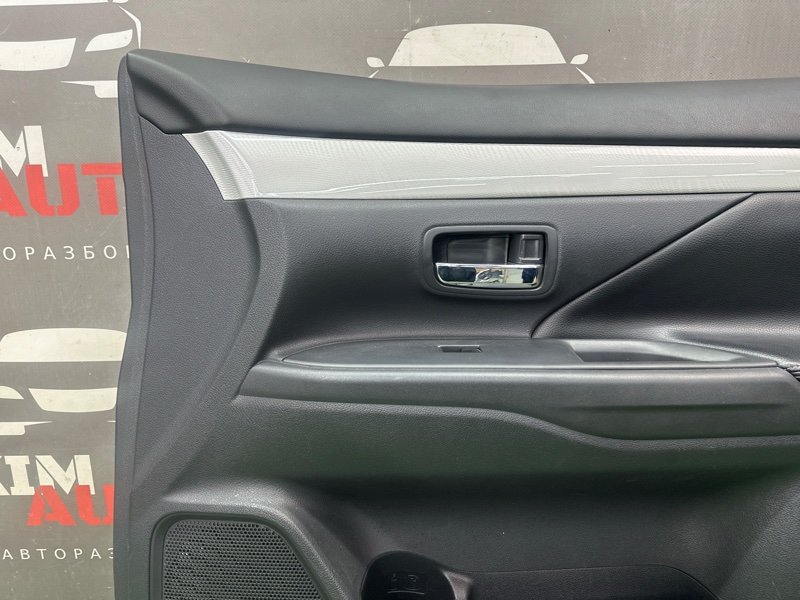 Обшивка двери Mitsubishi Outlander