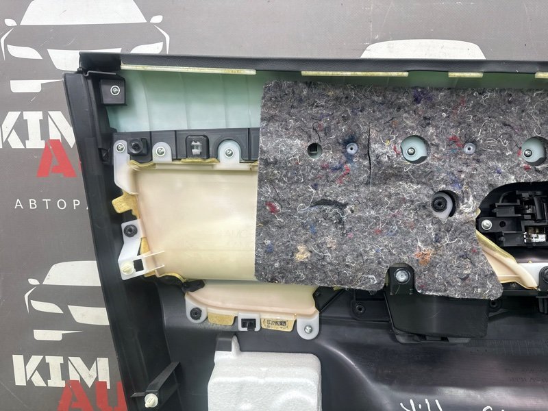 Обшивка двери Mitsubishi Outlander