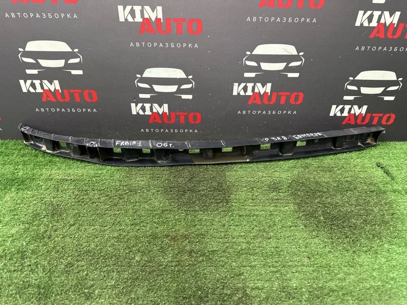 Кронштейн заднего бампера центральный Skoda Fabia 1