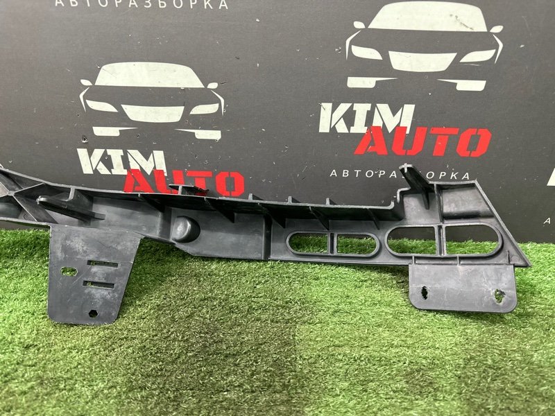Кронштейн бампера Opel Astra J