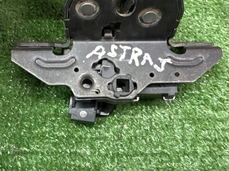 Замок багажника Opel Astra J