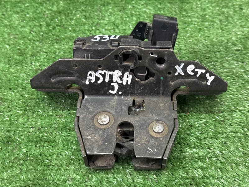 Замок багажника Opel Astra J