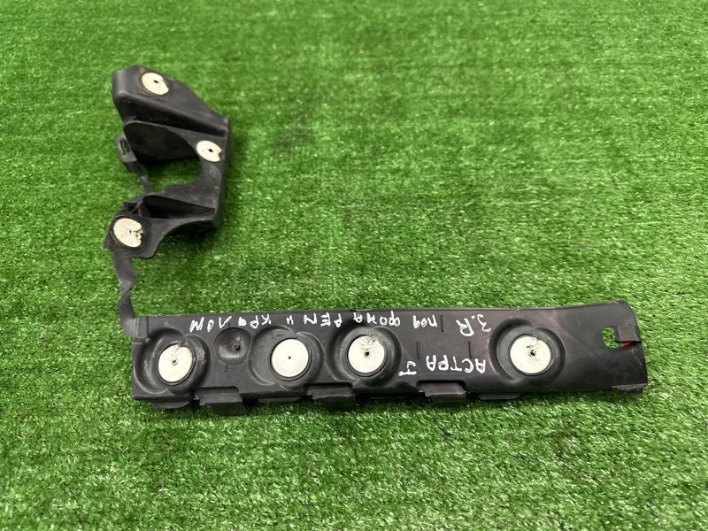 Кронштейн бампера Opel Astra J