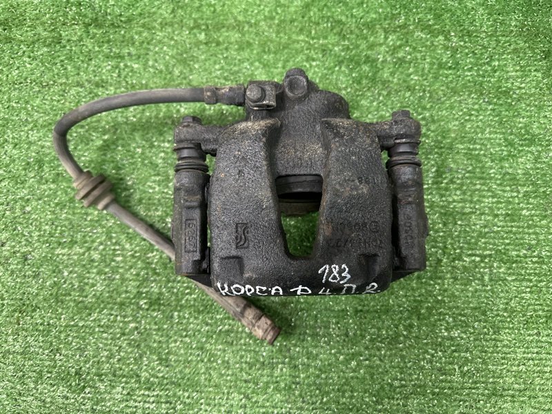 Суппорт тормозной Opel Corsa D