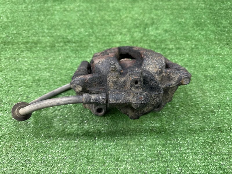 Суппорт тормозной Opel Corsa D