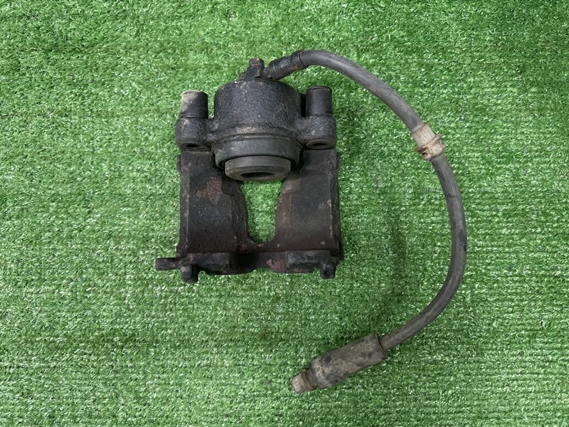 Суппорт тормозной Opel Astra