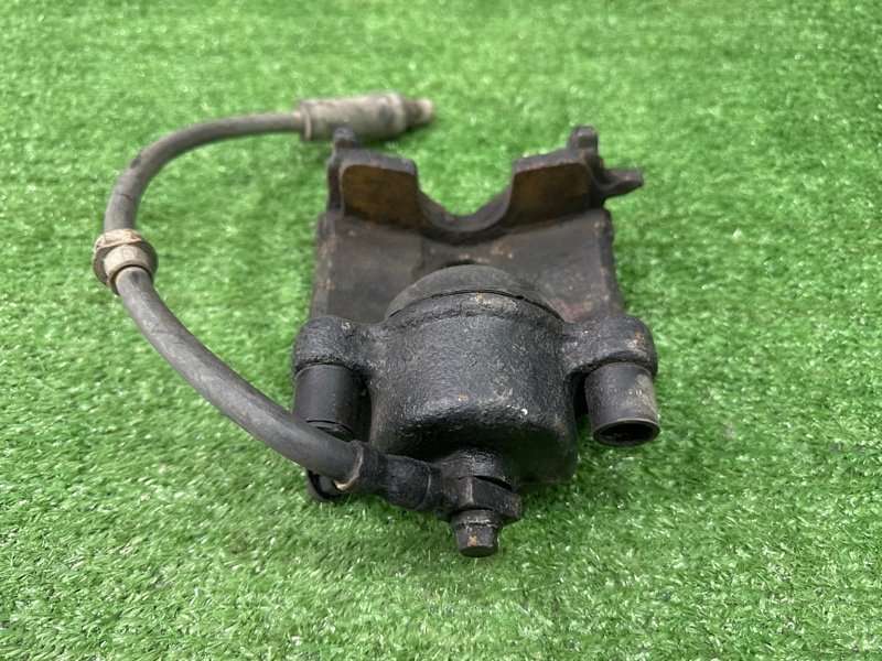 Суппорт тормозной Opel Astra