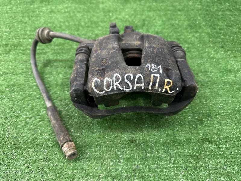 Суппорт тормозной Opel Corsa D