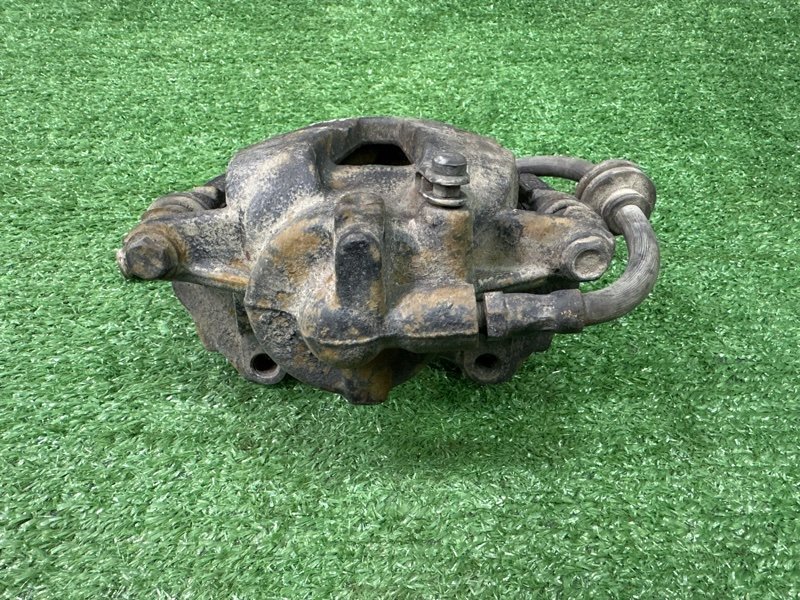 Суппорт тормозной Opel Corsa D